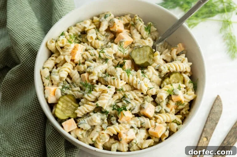 A creamy cold noodle dish with pickled cucumbers